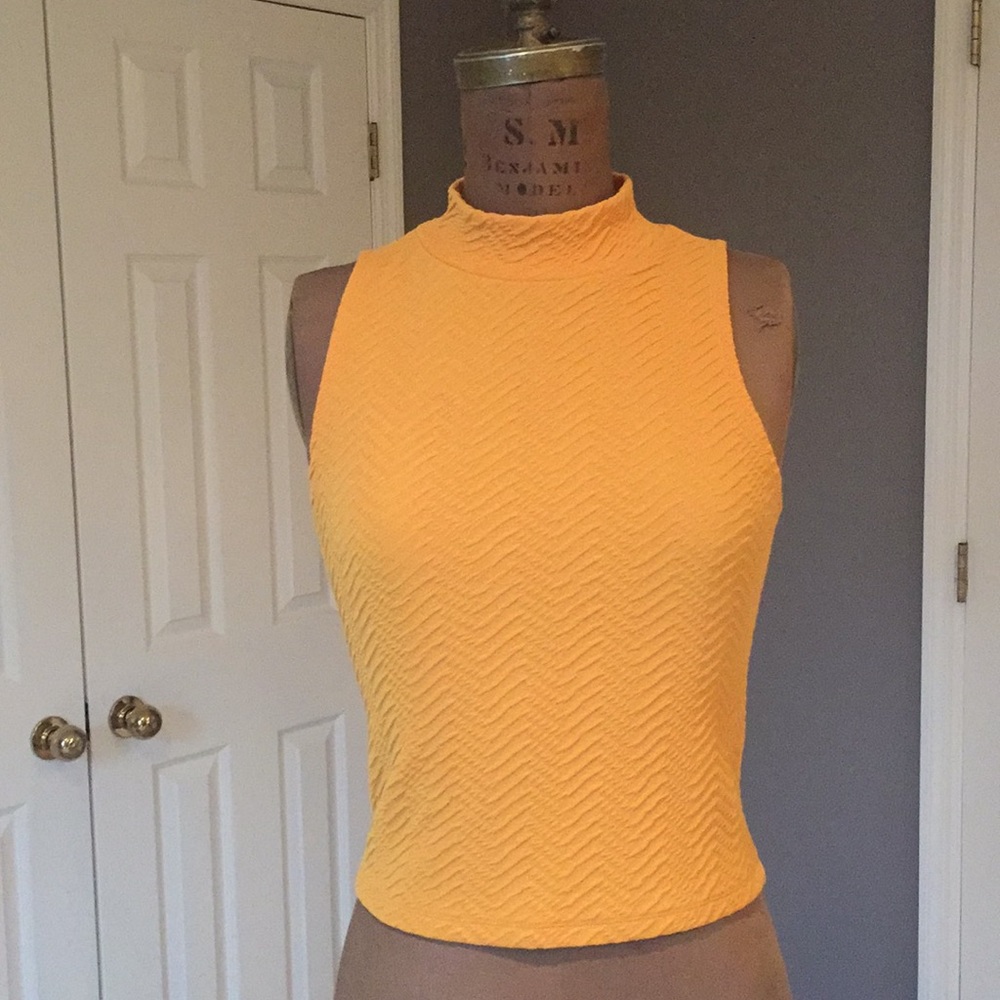 Sleeveless ribbed mustard yellow turtleneck